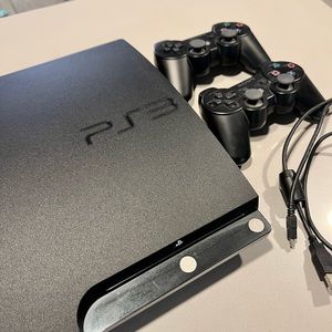 PlayStation 3 console and 2 x controllers